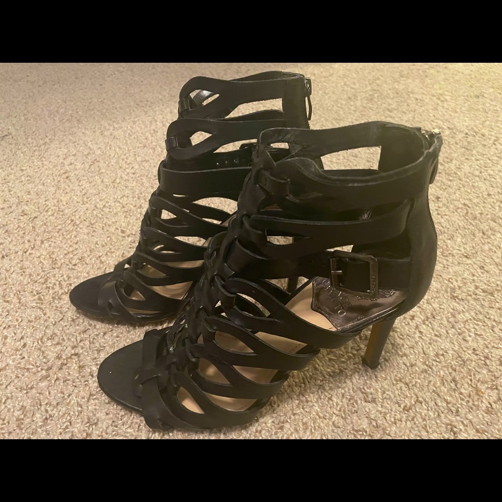 Black size 10 stiletto Vince Camuto heels. Slight signs of wear.